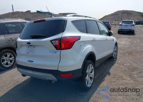 2019 Ford Escape Titanium z USA, uszkodzony, nr VIN 1FMCU9J98KUB43238